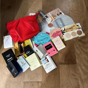 Sephora Red Cosmetic bag with full sized masks, primer and luxury samples